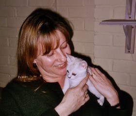Me-with-a-very-sweet-male-kitten-who-grew-up-to-be-our-first-stud-cat